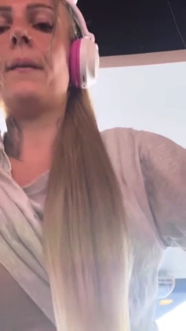 I visited the gym to exercise and my workout ignited a fiery desire. I stripped off my shirt, revealing my luscious breasts. The sight of my ample, natural bosom ignited an insatiable lust.